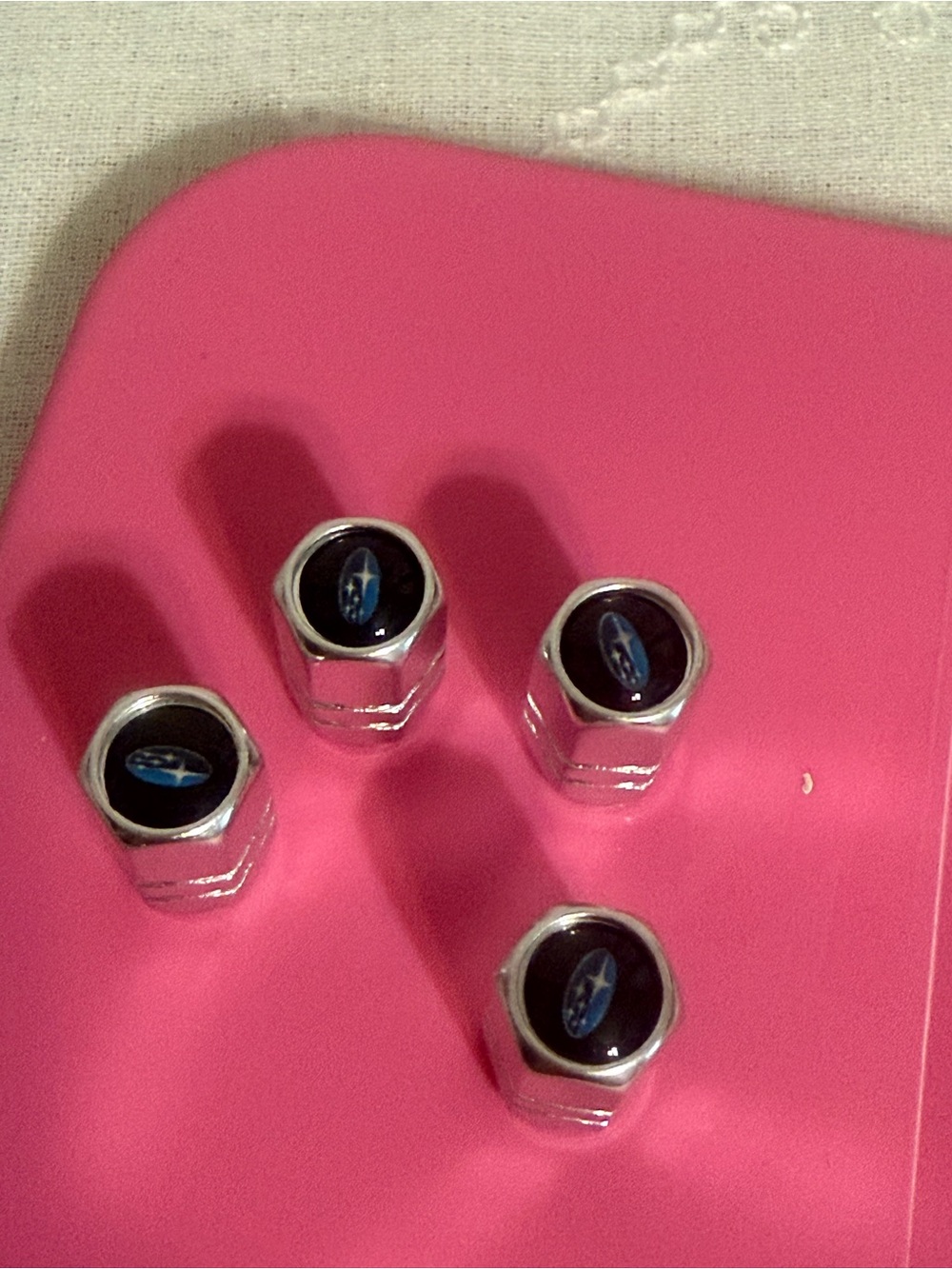Emblem Chrome Tire Valve Caps - Pink Accent